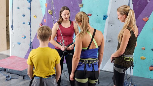 young-climbing-instructor-consulting-group-of-EK96WVS.jpg